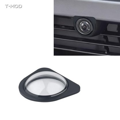 Black front camera lens protector installed on a Tesla front camera