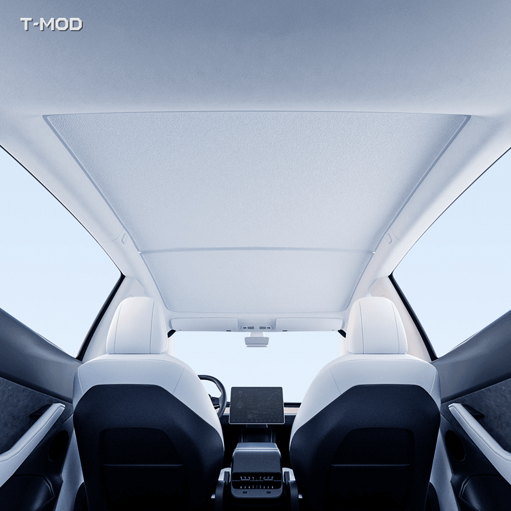 Beige two-piece graphene honeycomb roof sunshade installed in a Tesla Model Y Juniper