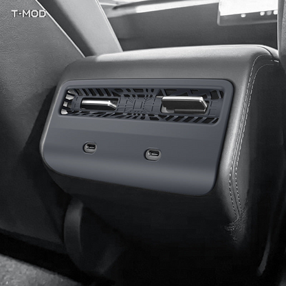 Silver gray matte rear air vent protection grid installed in a Tesla Model Y Standard
