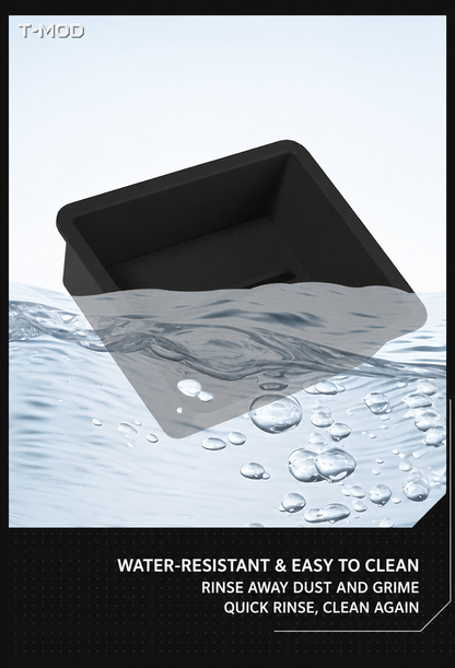 Black armrest organizer being rinsed with water, illustrating an easy-to-clean surface.
