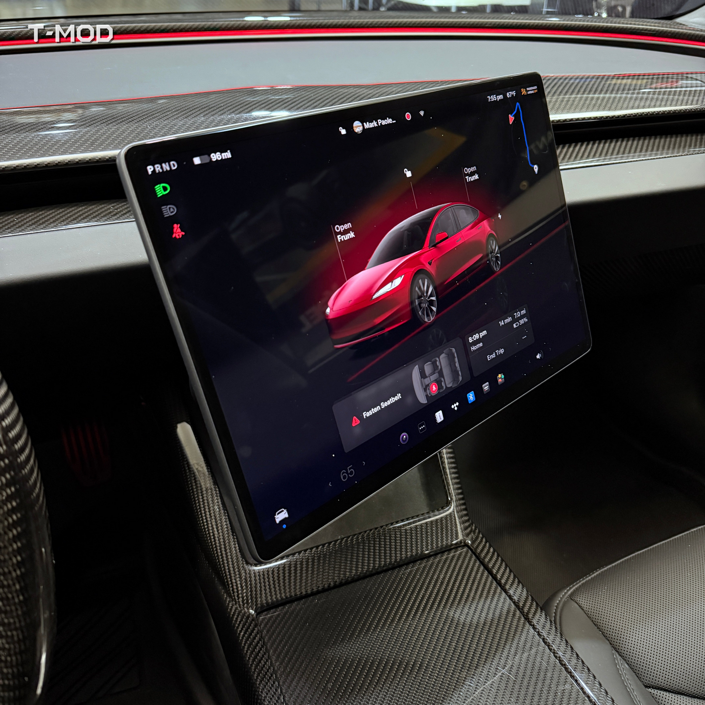 Left-hand-drive four-way swivel screen mount installed in a Tesla Model Y Juniper interior