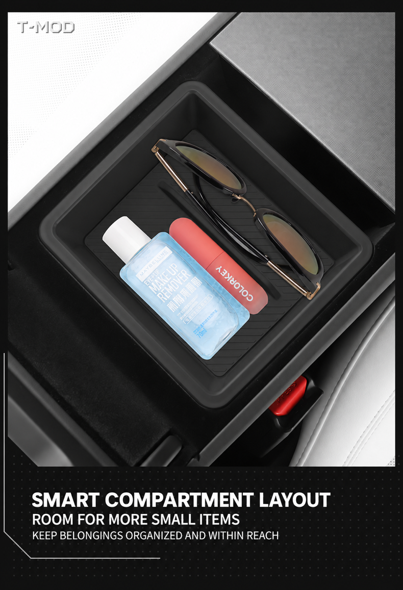 Divided black armrest organizer tray holding sunglasses and small items.