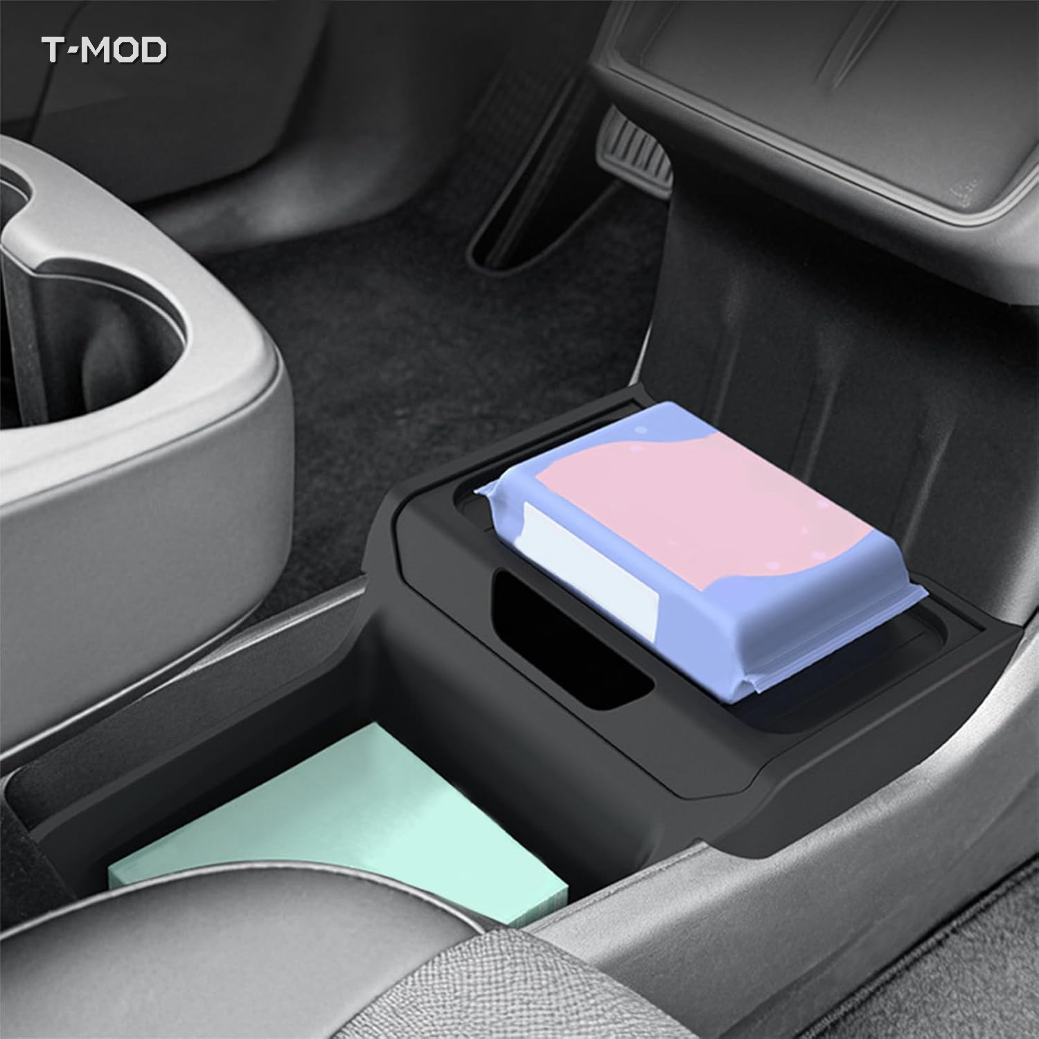 Black TPE under-center-console organizer tray installed beneath Tesla Model Y Standard center console