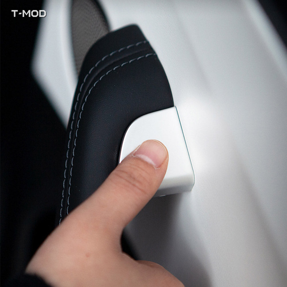 Silver door button switch protector installed on a Tesla Model 3 Highland and Model Y Juniper door handle