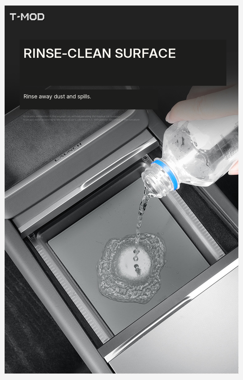 Water being poured over the center-console organizer to demonstrate rinsing away dust and spills; for Tesla Model 3 (2024+) — Highland, Tesla Model Y (2025+) — Juniper — AWD, and Tesla Model YL (2025+) — 6-Seater.