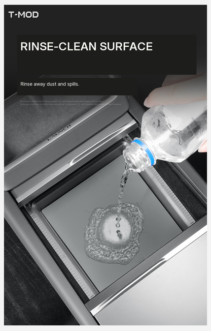 Water being poured over the center-console organizer to demonstrate rinsing away dust and spills; for Tesla Model 3 (2024+) — Highland, Tesla Model Y (2025+) — Juniper — AWD, and Tesla Model YL (2025+) — 6-Seater.