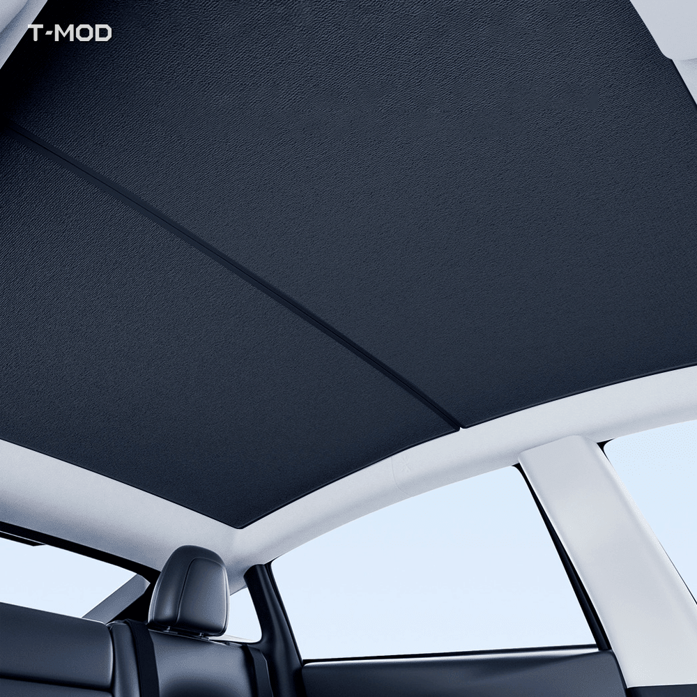 Black two-piece graphene honeycomb roof sunshade installed in a Tesla Model Y Juniper