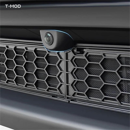 Close-up of honeycomb mesh lower-grille insect net on Tesla Model Y Juniper