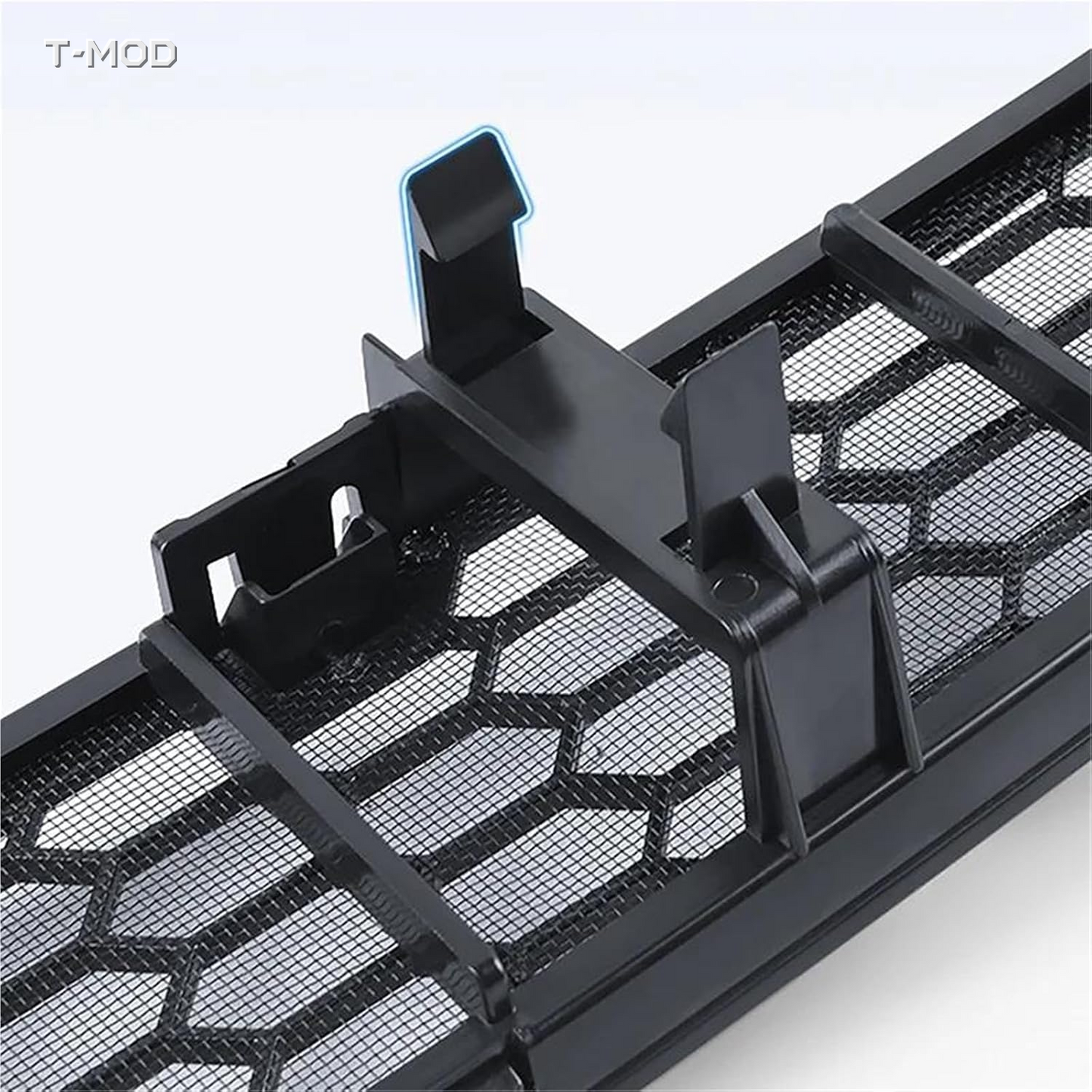 Rear view of the two-piece lower-grille insect net showing quick-release structure