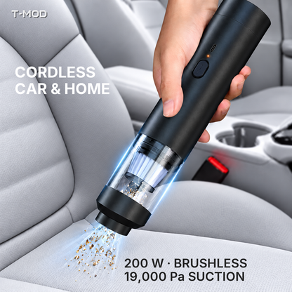 Black cordless handheld vacuum cleaning a car seat