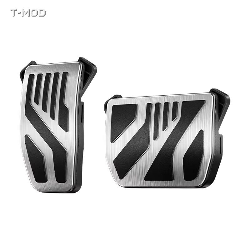 Sculpted aluminum-alloy accelerator and brake pedal covers with black accents and clip-on tabs